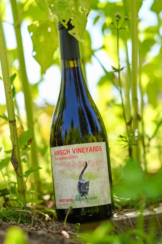 A bottle of Hirsch Bohan-Dillon Pinot Noir in the garden.