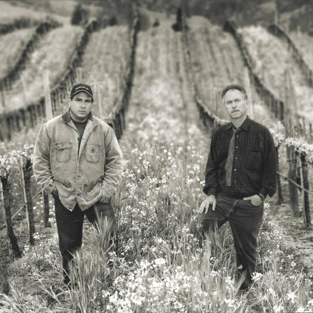 Everardo Robledo and David Hirsch standing in a vineyard.