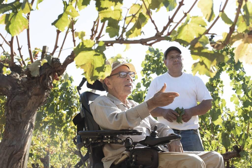 David Hirsch talking to Everardo Robledo and team at the vineyard.
