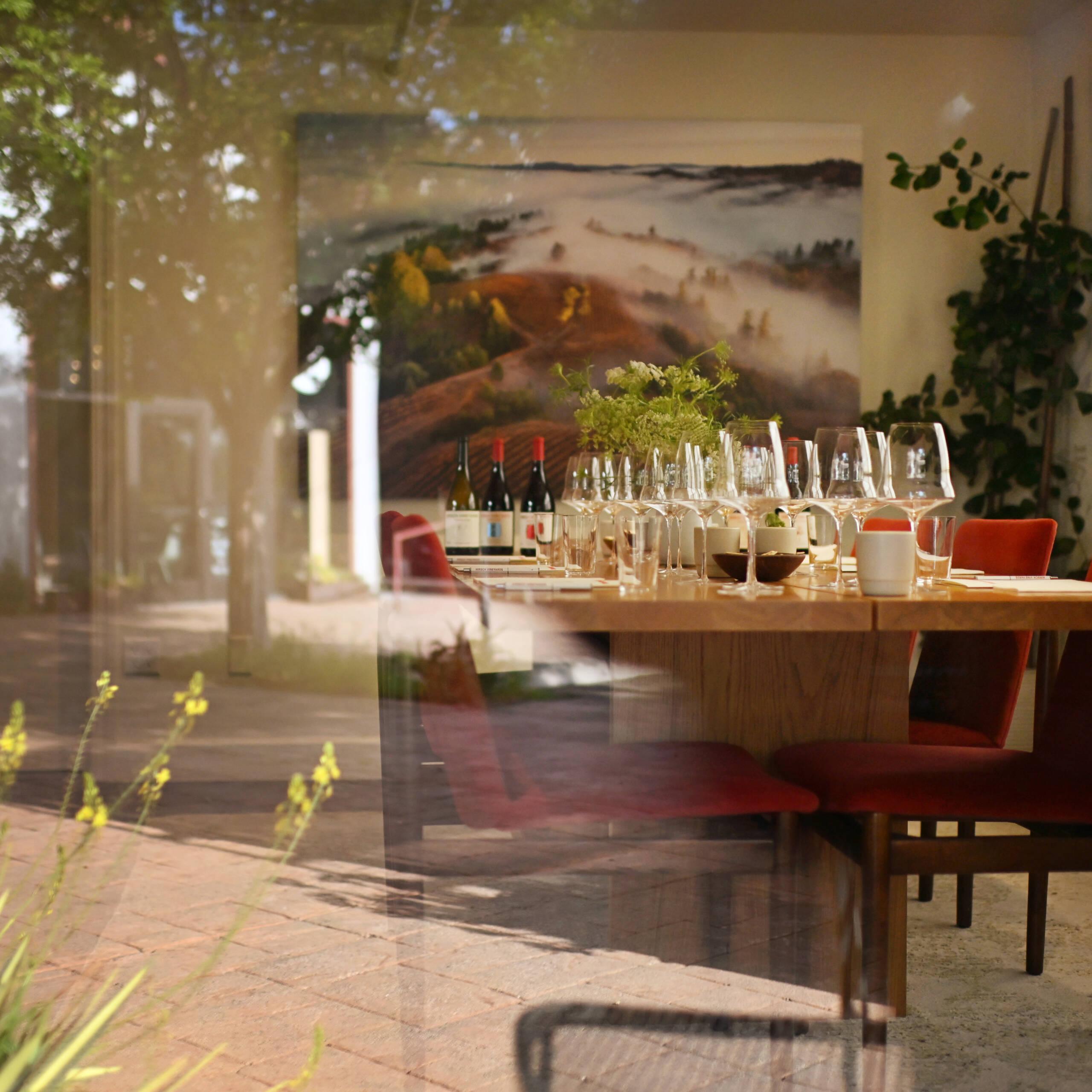 Hirsch Vineyards tasting room with table set for wine tasting.